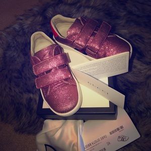 Gucci toddler sneakers picture shows slight scrap
